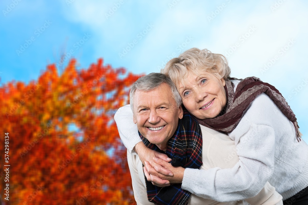 old happy couple have fun at park