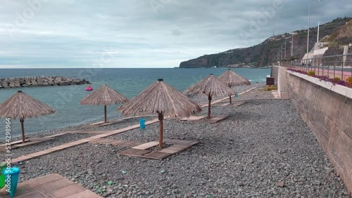 Empty beach by the sea. Bad weather. photo