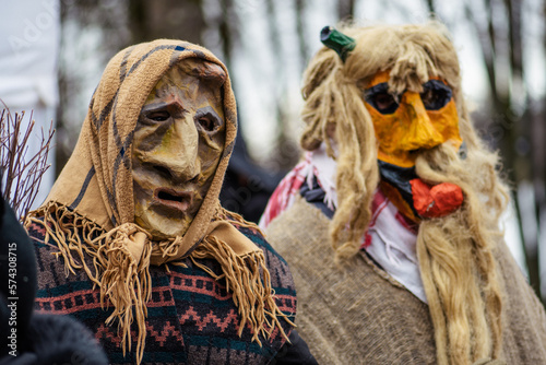 Traditional masks and costumes in Lithuania during Uzgavenes, a Lithuanian folk festival during Carnival, seventh week before Easter photo