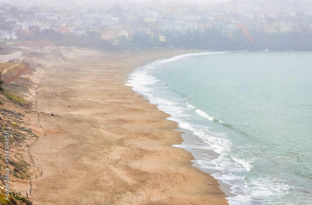 Bakers Beach aerial view over Californian sandy beach near San Francisco Bay, Pacific Ocean, gorgeous seascape in light mist, perfect travel and vacation destination
