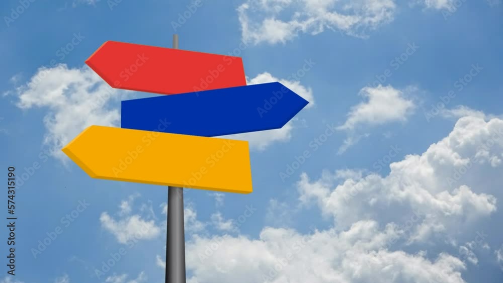travel destinations options. Direction road sign with colorful arrows on sky and clouds in movement travel destinations options. Direction road sign with colorful arrows on sky and clouds in movement