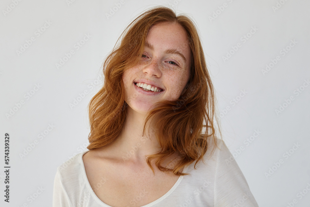 ginger female smiles broadly and feels happy ginger female smiles broadly and feels happy