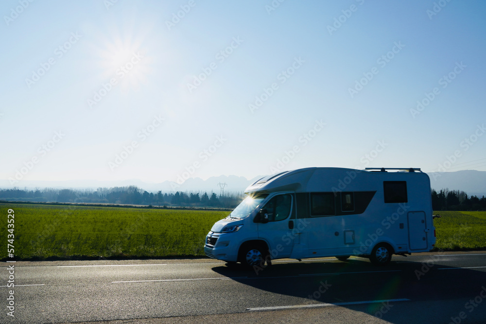 Motorhome family vacation travel, motorhome vacation travel, Caravan car Vacation.  Traveling in Camper Van. Beautiful natural landscape of France with space for text.