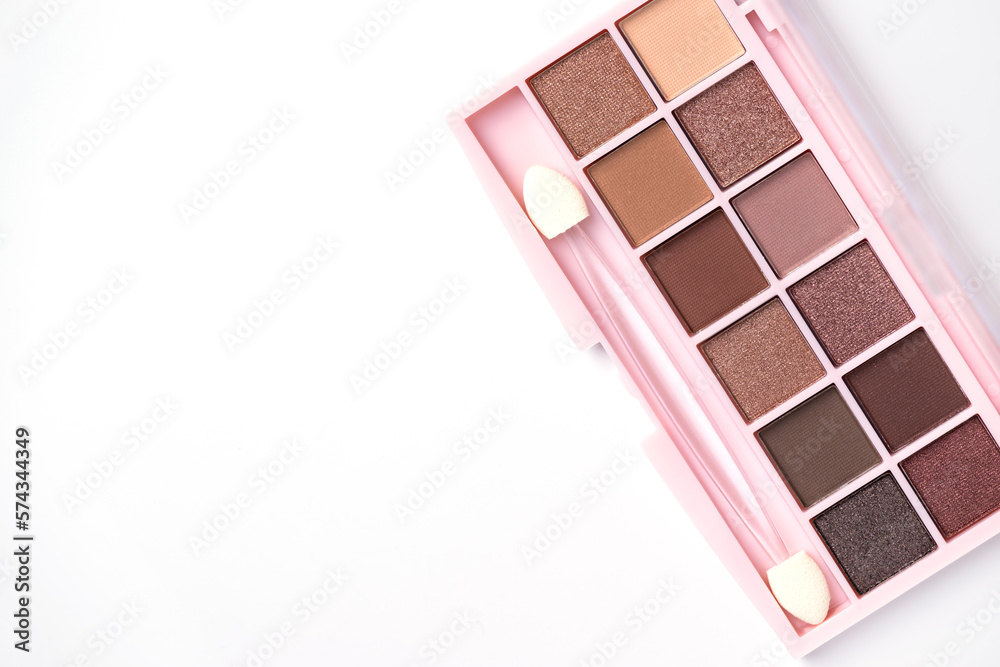 Beige eye shadow palette top view. Decorative cosmetics. Beauty products. Nude brown eye shadow. Beige eye shadow palette top view. Decorative cosmetics. Beauty products. Nude brown eye shadow.