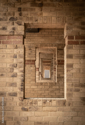 Brick wall with repeating windows