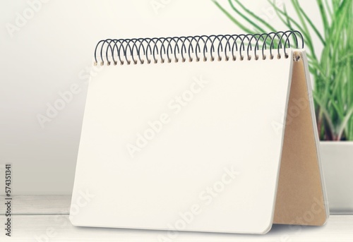 Blank office calendar or planner on desk