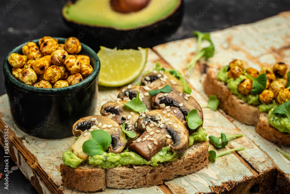 vegetarian sandwiches with avocado guacamole, chickpeas and mushrooms,