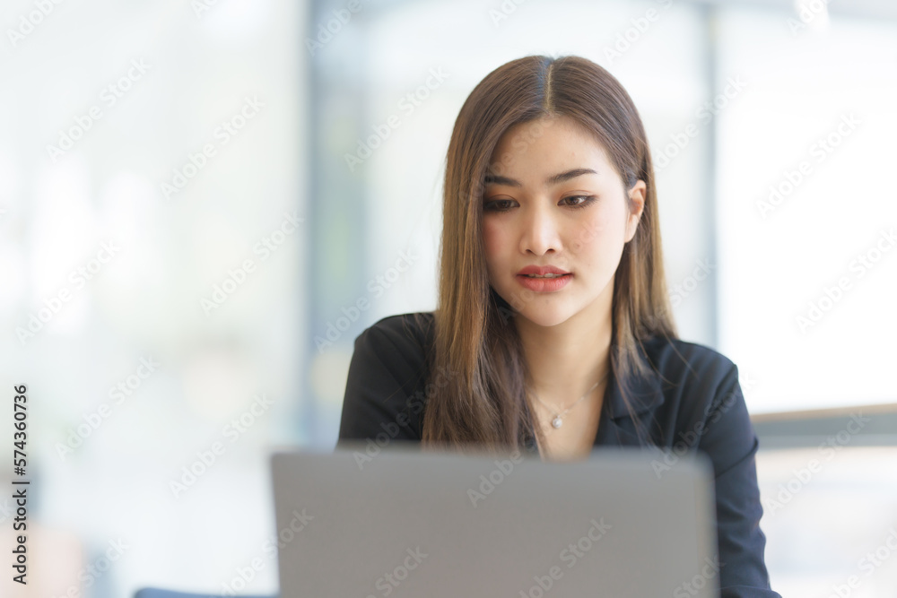 Attractive asia busy business woman consultant auditor working at modern office with balance sheet accounting bookkeeping documents. Account verification to prevent fraud bribery. Attractive asia busy business woman consultant auditor working at modern office with balance sheet accounting bookkeeping documents. Account verification to prevent fraud bribery.