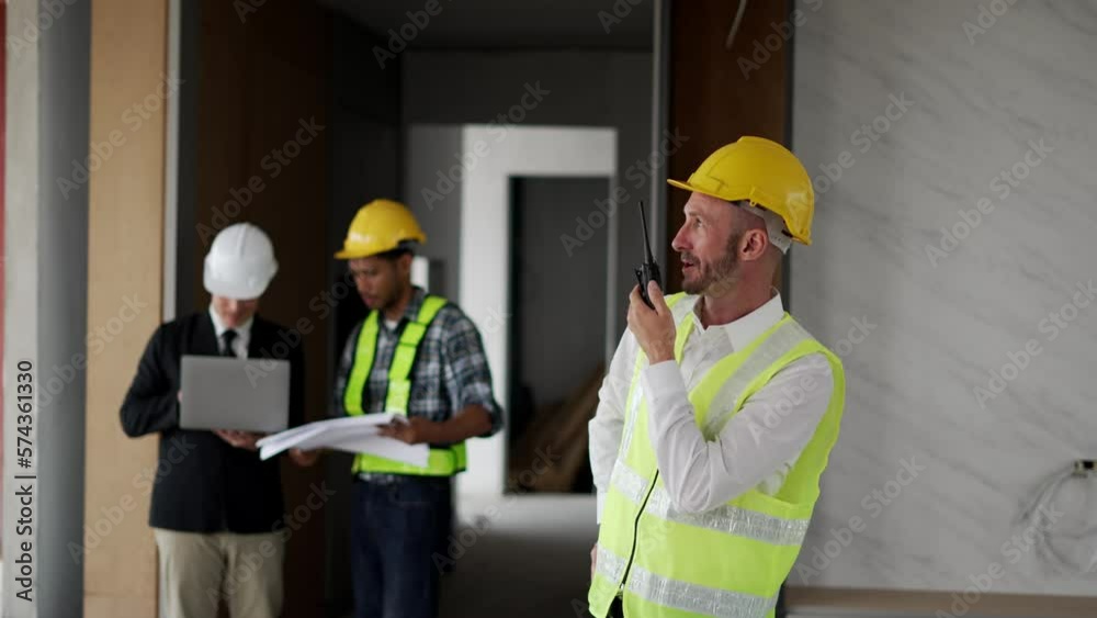 Businessman and architects discussing the sketches of the new project. Businessman and architects discussing the sketches of the new project.