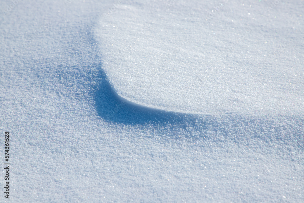 A close-up of a snow bump made by a blizzard