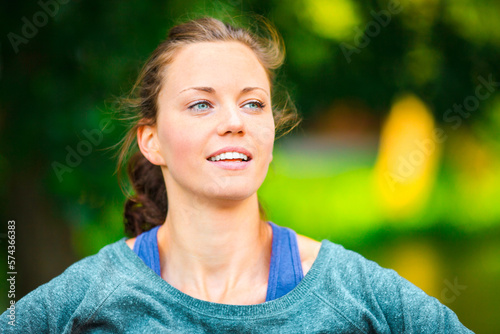 Close up portrait of a young healthy sporty brunette woman