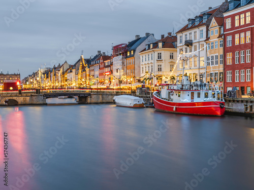 Colorful building of the old Nyhavn harbour lit up with Christmas lights  Copenhagen  Denmark