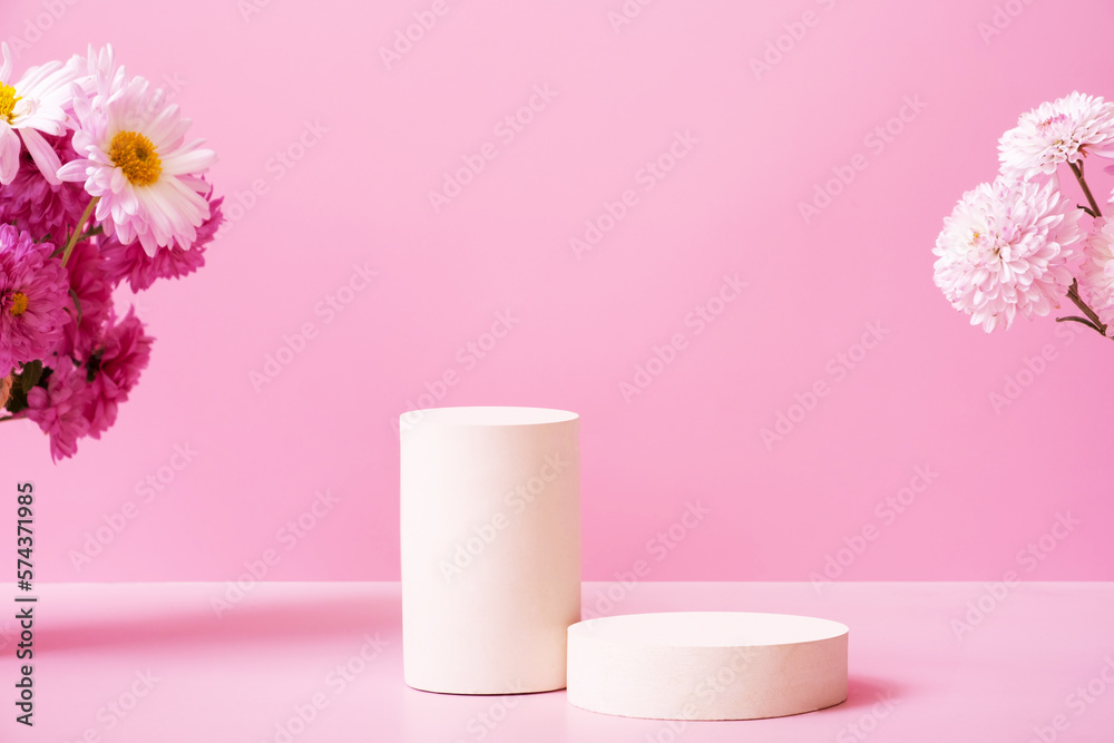 Podium or pedestal with chrysanthemum flowers. Mockup for your cosmetic products
