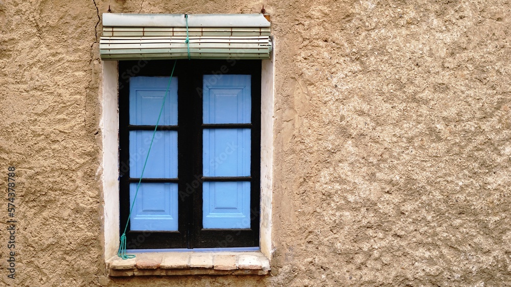 Obraz premium rustic window in facade as background