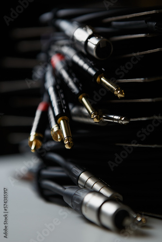 Set of high quality audio cables in music store. Stock of 6.3 mm jack to xlr connectors