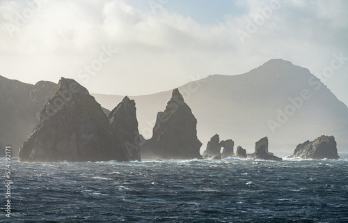 Jagged rocky outcroppings off Hornos Island near Cape Horn in Chile