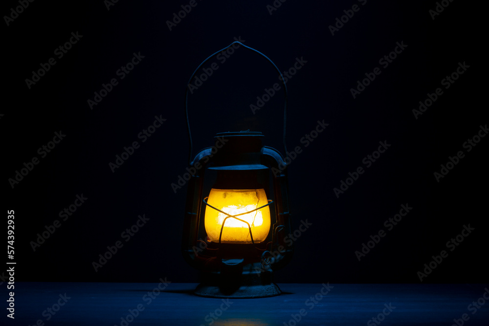 Vintage lantern on blue background