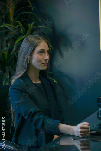 woman with computer in the city female marketing professional manager creative content meeting work office consultation presentation female working long hair businesswoman 