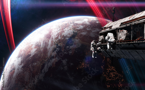 Fototapeta Naklejka Na Ścianę i Meble -  Space station in front of inhabited deep space planet. Science fiction. Elements of this image furnished by NASA