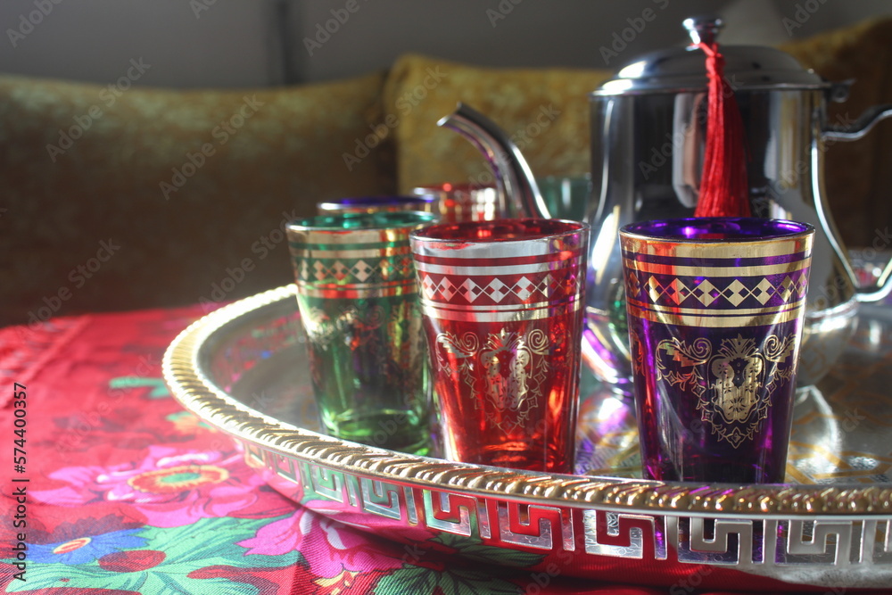 Moroccan tea,Tea pouring into glass from metal teapot