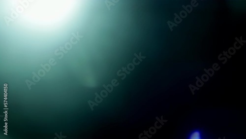 Real defocused light Flare moves from left to right at top frame, effect for overlay 4k