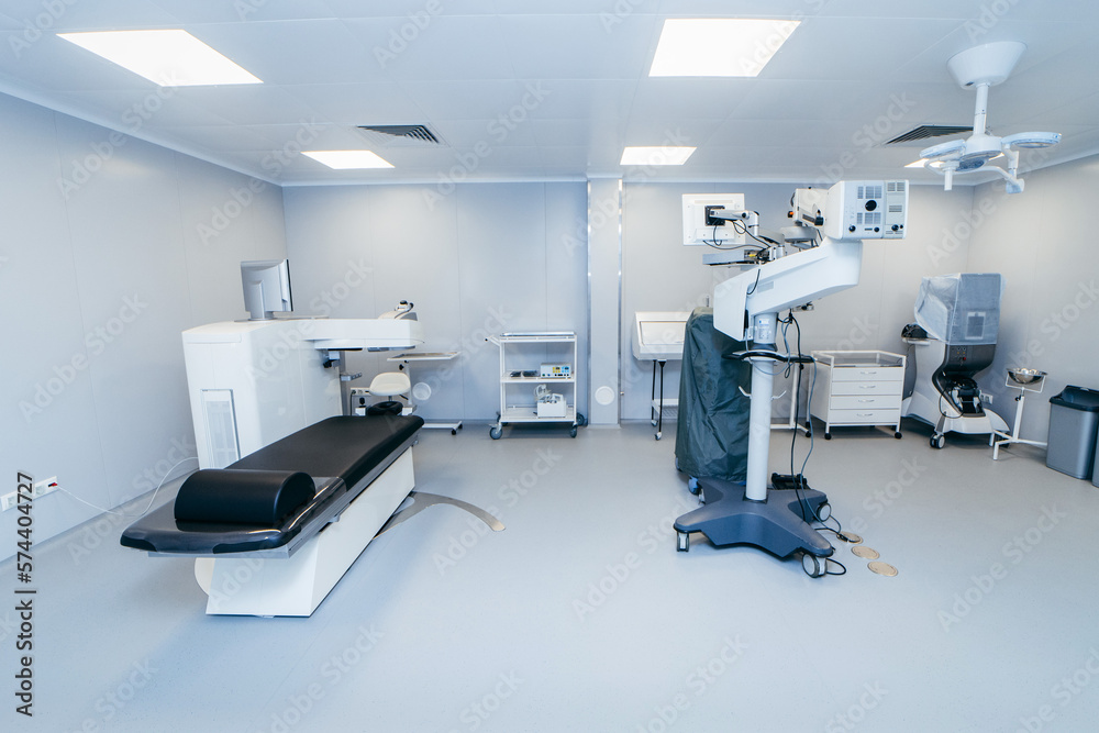 Interior of modern ophthalmology operating room with modern equipment Interior of modern ophthalmology operating room with modern equipment