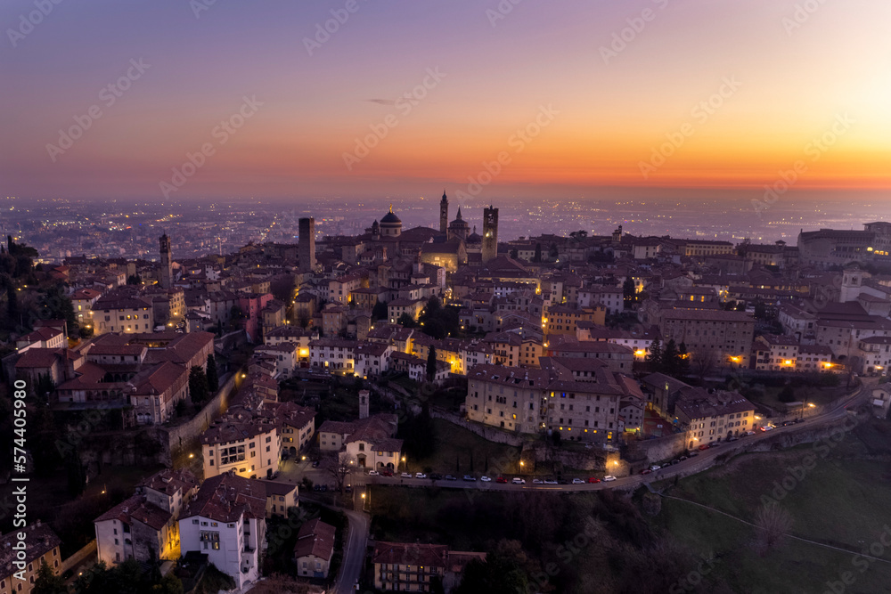High point of view at buildings in Bergamo Alta during dusk, Lombardy Italy.