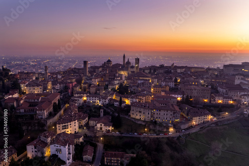 High point of view at buildings in Bergamo Alta during dusk, Lombardy Italy.