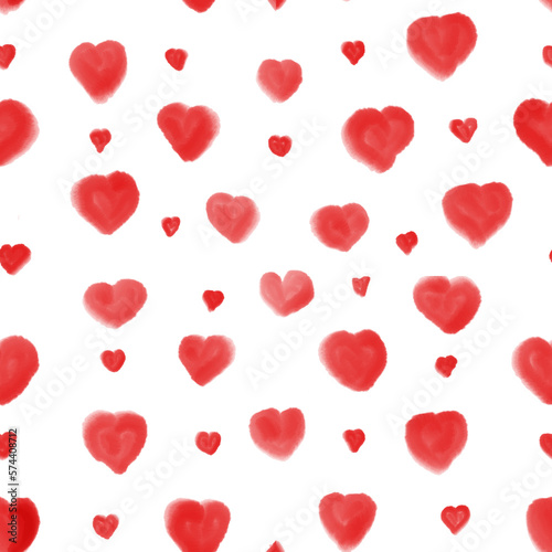 Seamless hand-painted watercolor red hearts pattern on pink background.