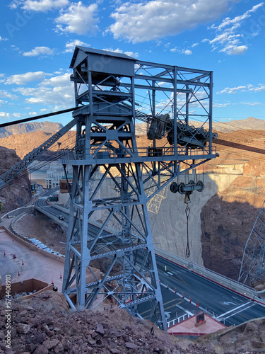 Hoover Dam is a concrete arch-gravity dam in the Black Canyon of the Colorado River, on the border between the U.S. states of Nevada and Arizona. photo