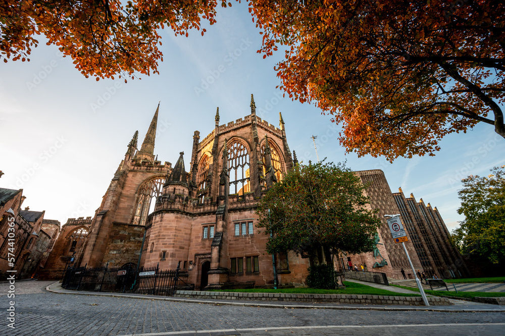 Framed view of Coventry Cathedral With winter trees in England