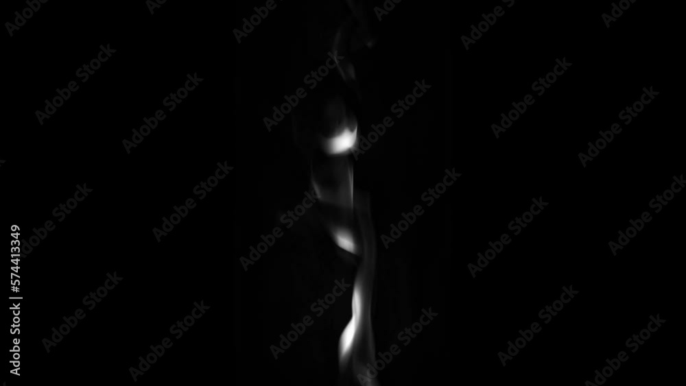 Smoke rises in a trickle from bottom to top on a dark background. High quality Full HD footage. Smoke rises in a trickle from bottom to top on a dark background. High quality Full HD footage.