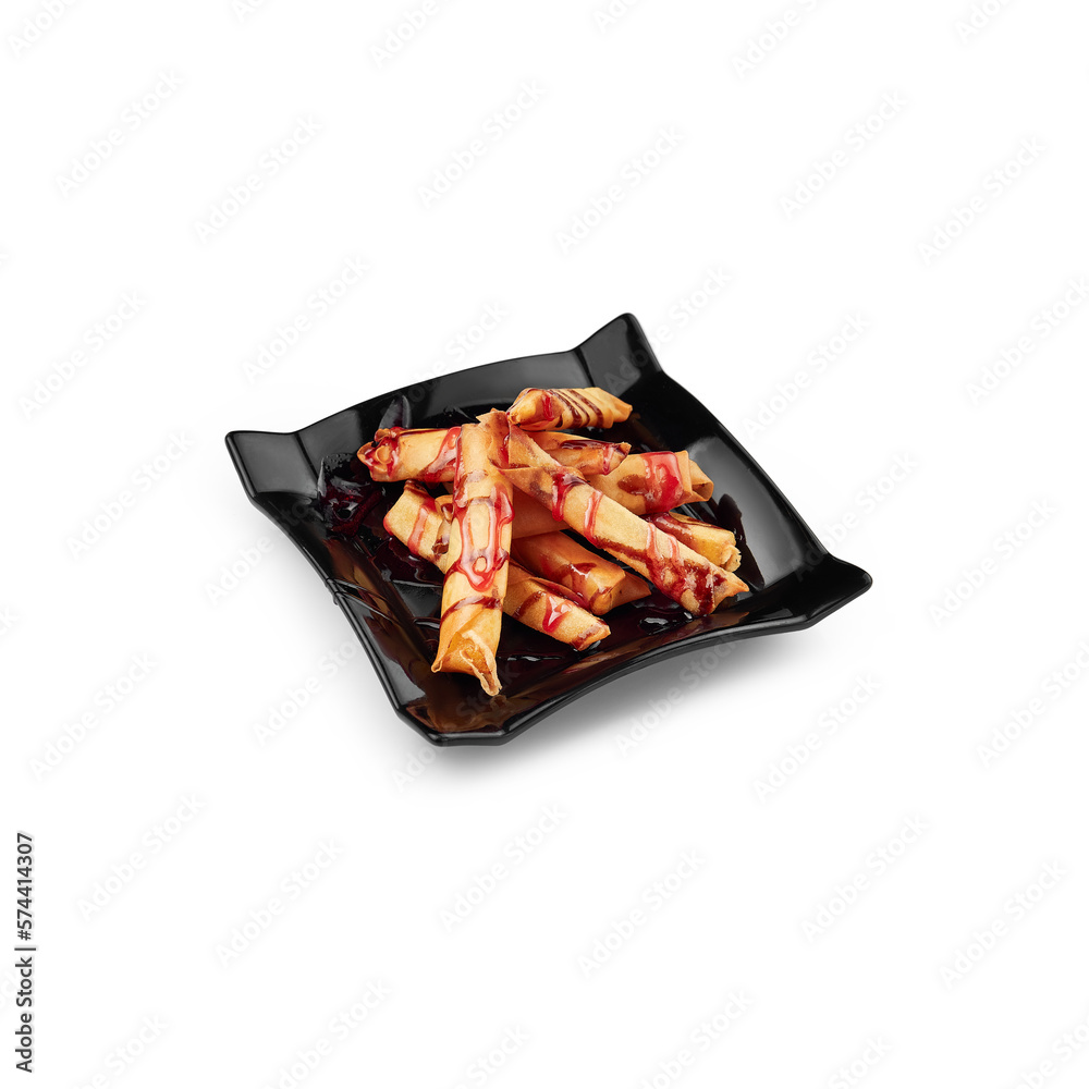 dessert called Banana served black plate white background isolation dessert called Banana served black plate white background isolation
