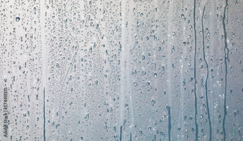 water drops on a window or in the shower cabin,wet transparent panorama background