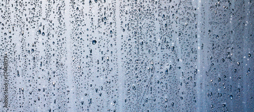 water drops on a window or in the shower cabin,wet transparent panorama background