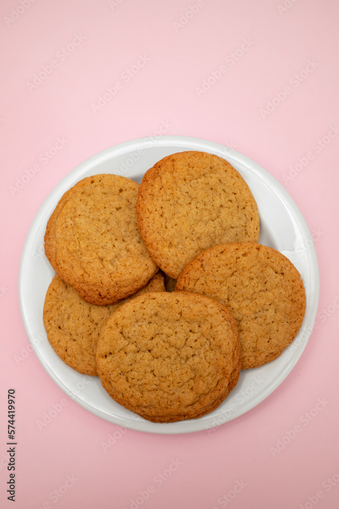 Few homemade cookies on white small dish