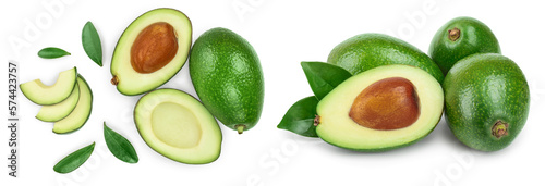 Fototapeta Naklejka Na Ścianę i Meble -  avocado and slices decorated with green leaves isolated on white background. Top view. Flat lay