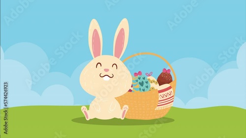 spring eggs painted in basket with rabbit landscape