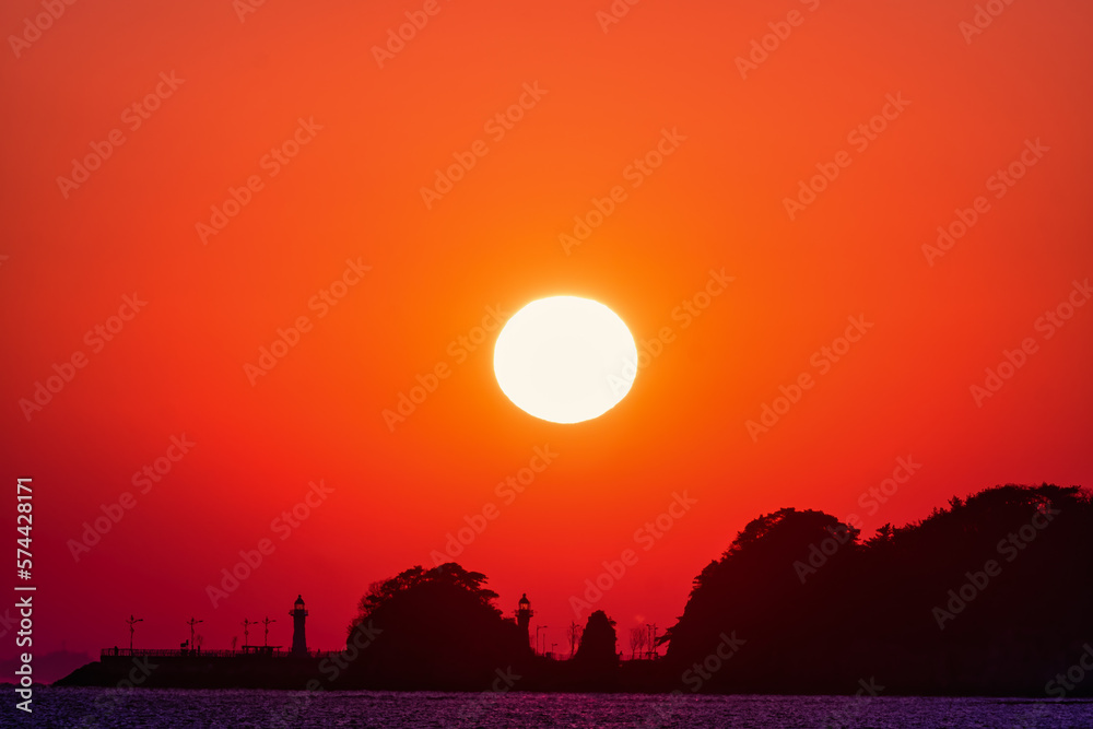 Scenic view of the Sun against sky during sunrise Scenic view of the Sun against sky during sunrise