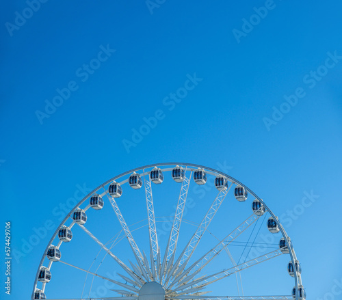 Ferris wheel attraction in center of Gdansk, Poland. Lot's of copy space. Sky background
