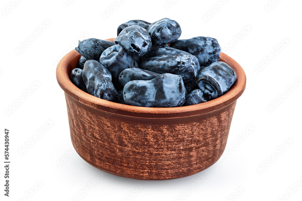 Fresh honeysuckle blue berry in ceramic bowl isolated on white background with full depth of field Fresh honeysuckle blue berry in ceramic bowl isolated on white background with full depth of field