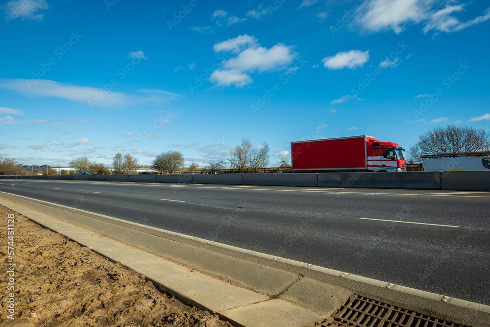 HGV vehicle truck traveling on motorway in England UK