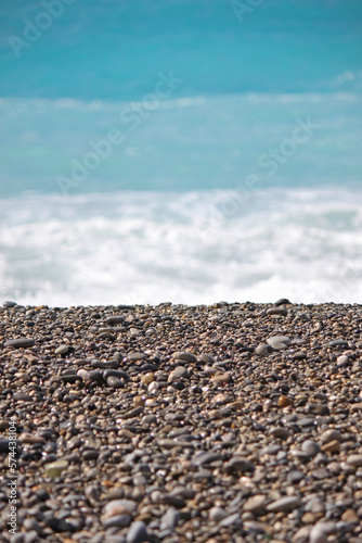 Beautiful view of stony beach and blue sea, Nice, France