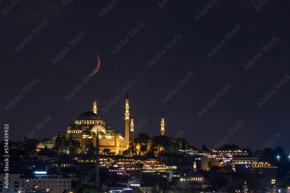 Fototapeta premium Ramadan concept photo. Crescent moon and Mosque. Islamic or kandil or laylat al-qadr background. Noise included.
