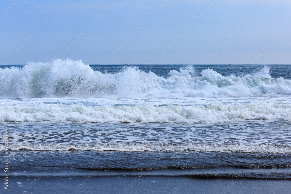 Fototapeta premium Pacific coast, big waves, volcanic black sand, Kamchatka.