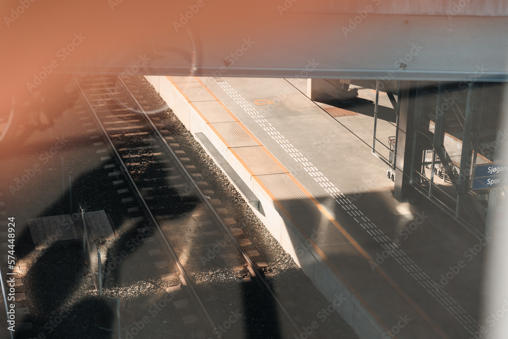 Train station with railway through glass window