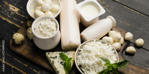 Obraz na plátne Different dairy products on wooden table