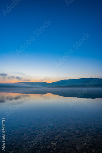sunrise over the lake © George Kurashvili