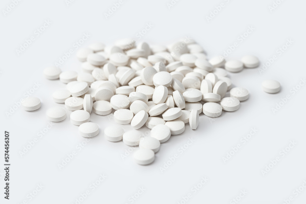 Heap of medicine white pills, antibiotic tablets, drugs. Pharmacy theme Heap of medicine white pills, antibiotic tablets, drugs. Pharmacy theme