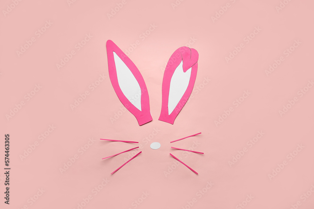 Paper bunny on pink background